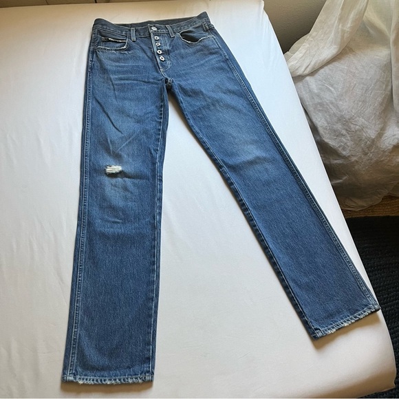 AMO medium blue wash exposed button fly straight leg distressed cropped jeans